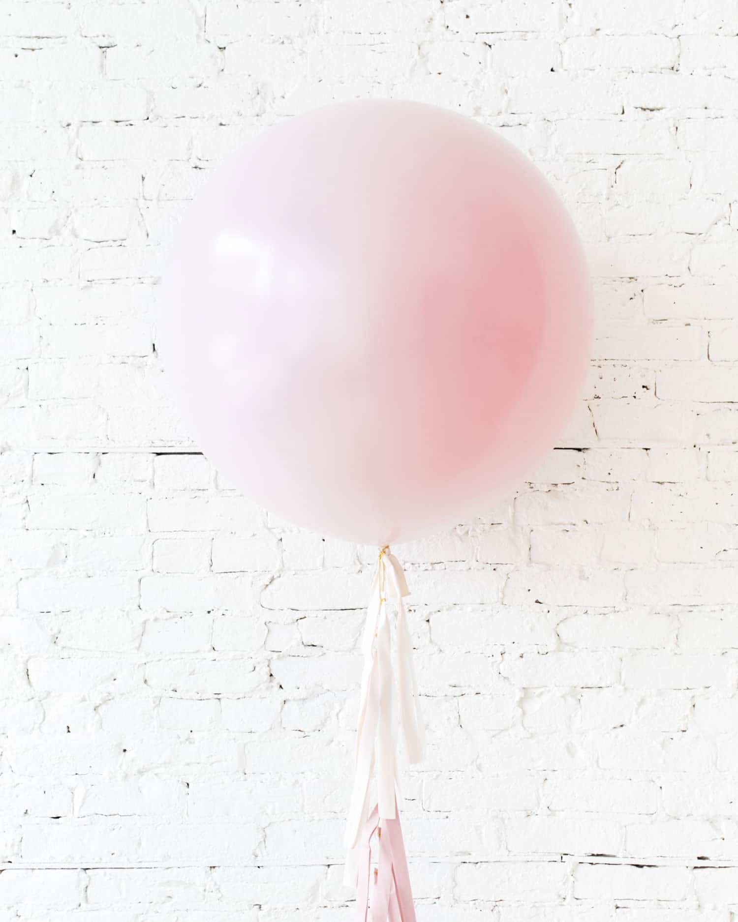 Pearl Light Rose Giant Balloon and Ombre Pink Tassel | Rental