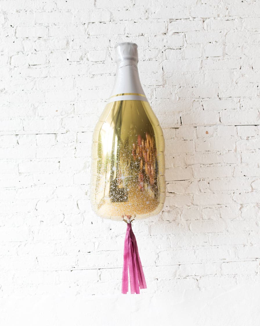 36in Gold Champagne Bottle Foil Balloon with Burgundy Skirt | Rental