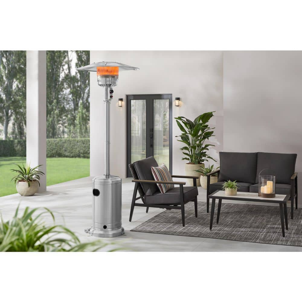 Hampton Bay — 48000 BTU Stainless Steel Propane Standing Patio Heater with Wheels | Rental Hampton Bay — 48000 BTU Stainless Steel Propane Standing Patio Heater with Wheels | Rental